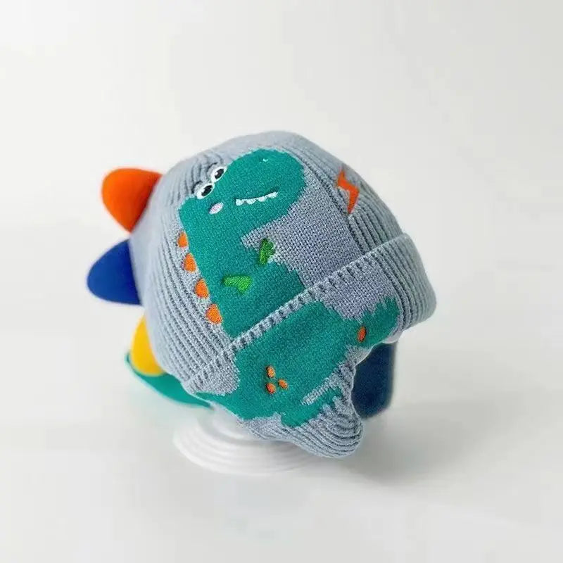Winter Baby Dinosaur Hat – Warm Knitted Wool Ear Protection Cap for Kids | 3D Cartoon Beanie with Earmuffs (2–6 Years)